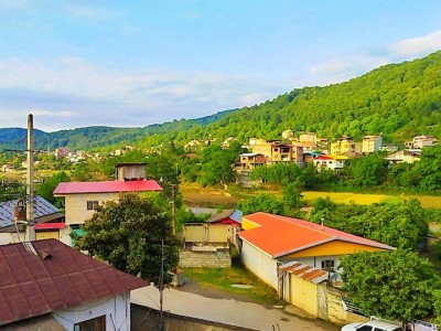 سوییت زیولا با منظره زیبای روستا و جنگل