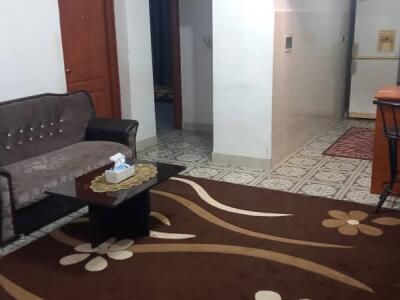 اقامتگاه مادر در محله‌ای آرام با چشم‌انداز شالیزار