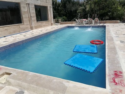 باغ ویلای استخر داربا اب سرد دو خوابه در محیطی آرامش بخش با