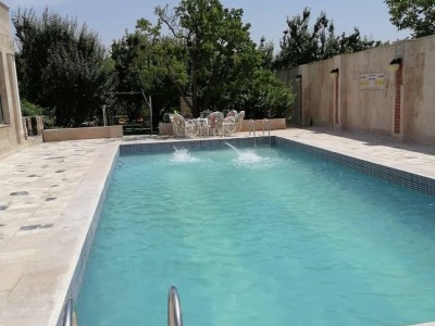 باغ ویلای استخر داربا اب سرد دو خوابه در محیطی آرامش بخش با