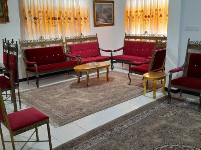دوخوابه مرتب همراه با حیاط سرسبز و پارکینگ مسقف