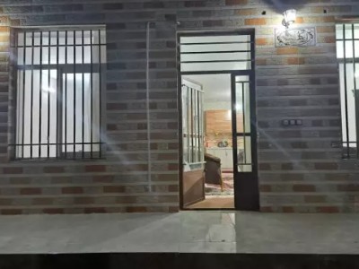 منزل همکف دو خواب و حیاط دار(جای پارک ۶ خودرو)