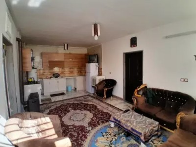 منزل همکف دو خواب و حیاط دار(جای پارک ۶ خودرو)