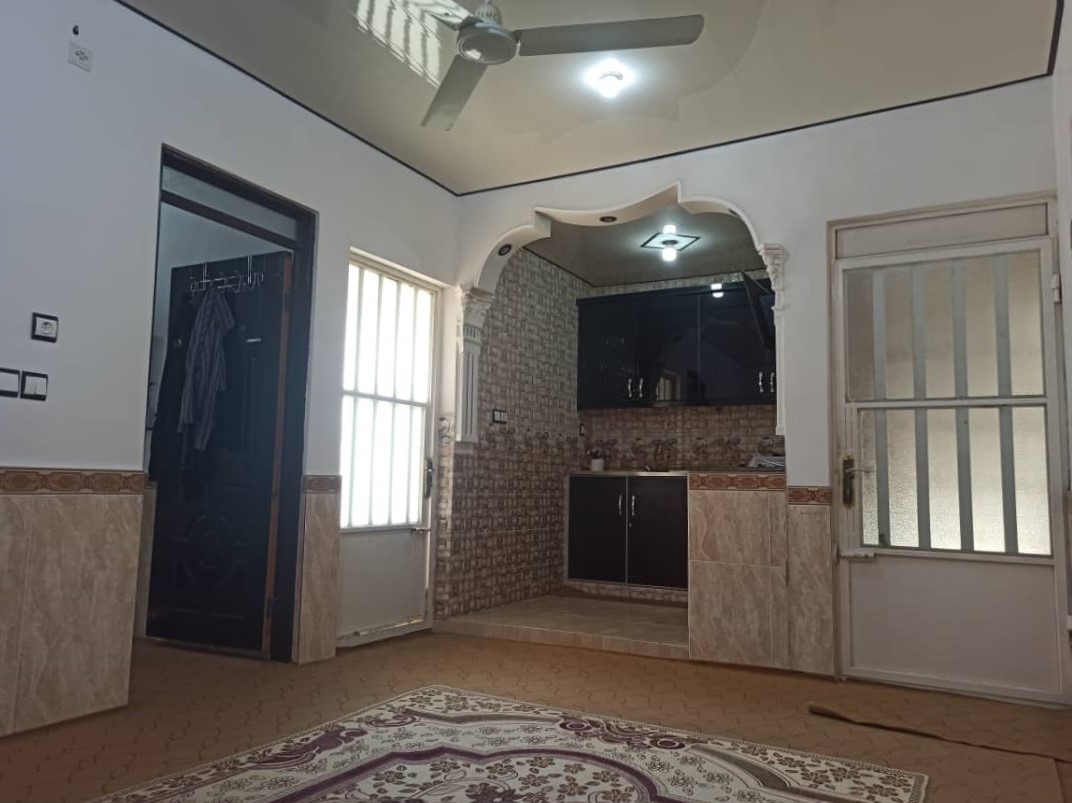 اتاق پذیرایی و آشپزخانه