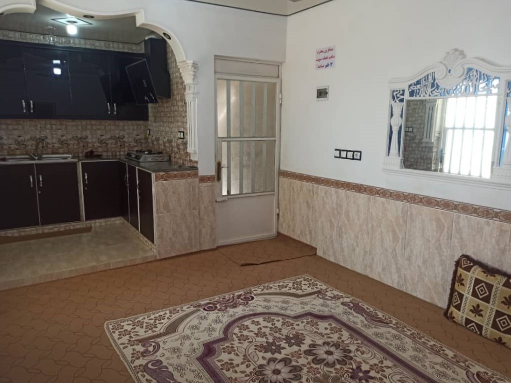 اتاق پذیرایی و آشپزخانه