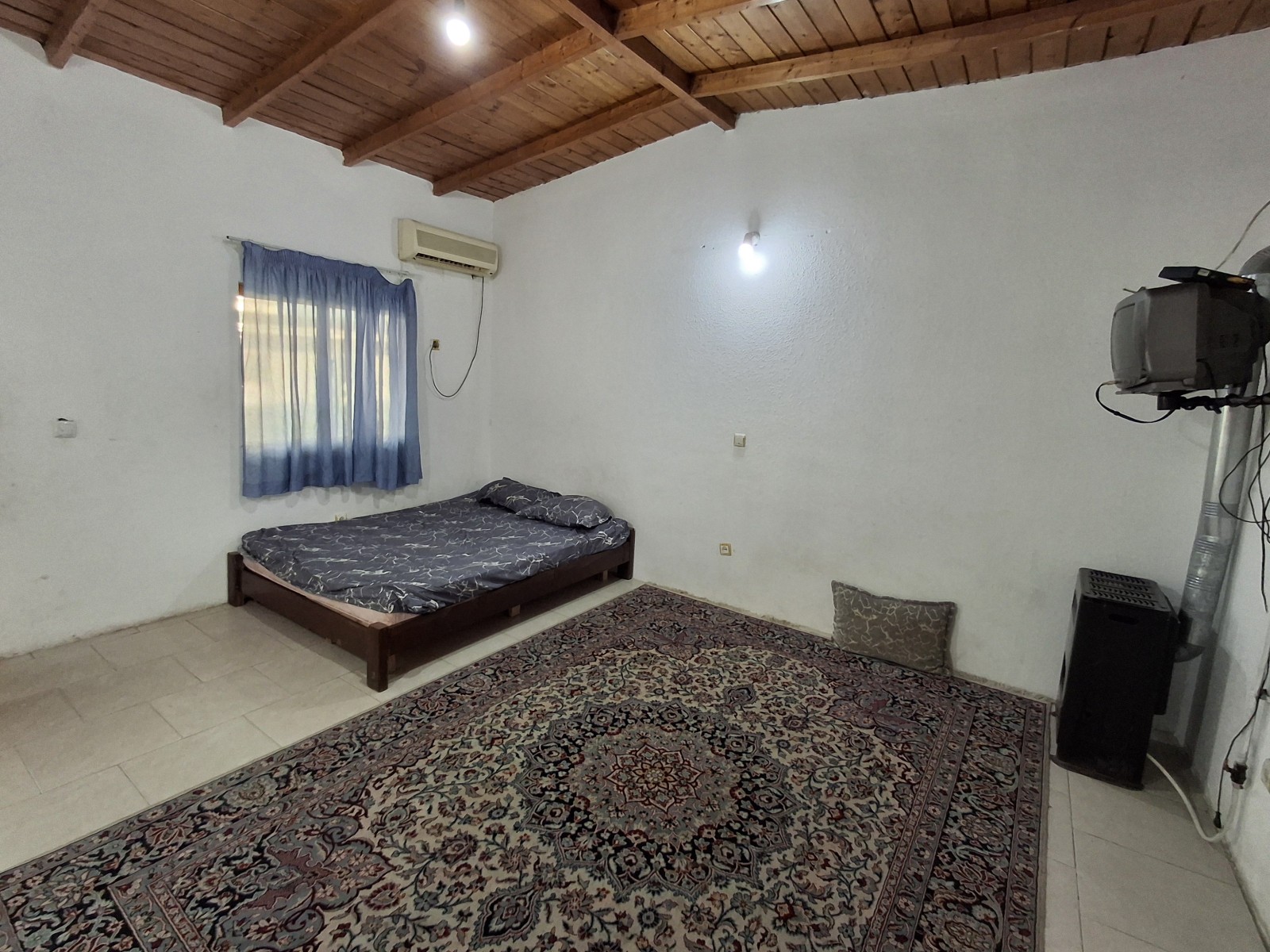 اتاق پذیرایی و تخت خواب