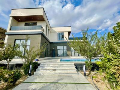 ویلای دوبلکس مدرن با استخر آبگرم سرپوشیده فستا در کردان