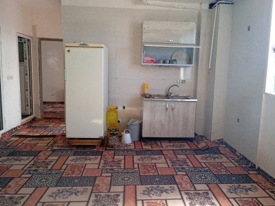 واحد دوخوابه در محیطی سرسبز