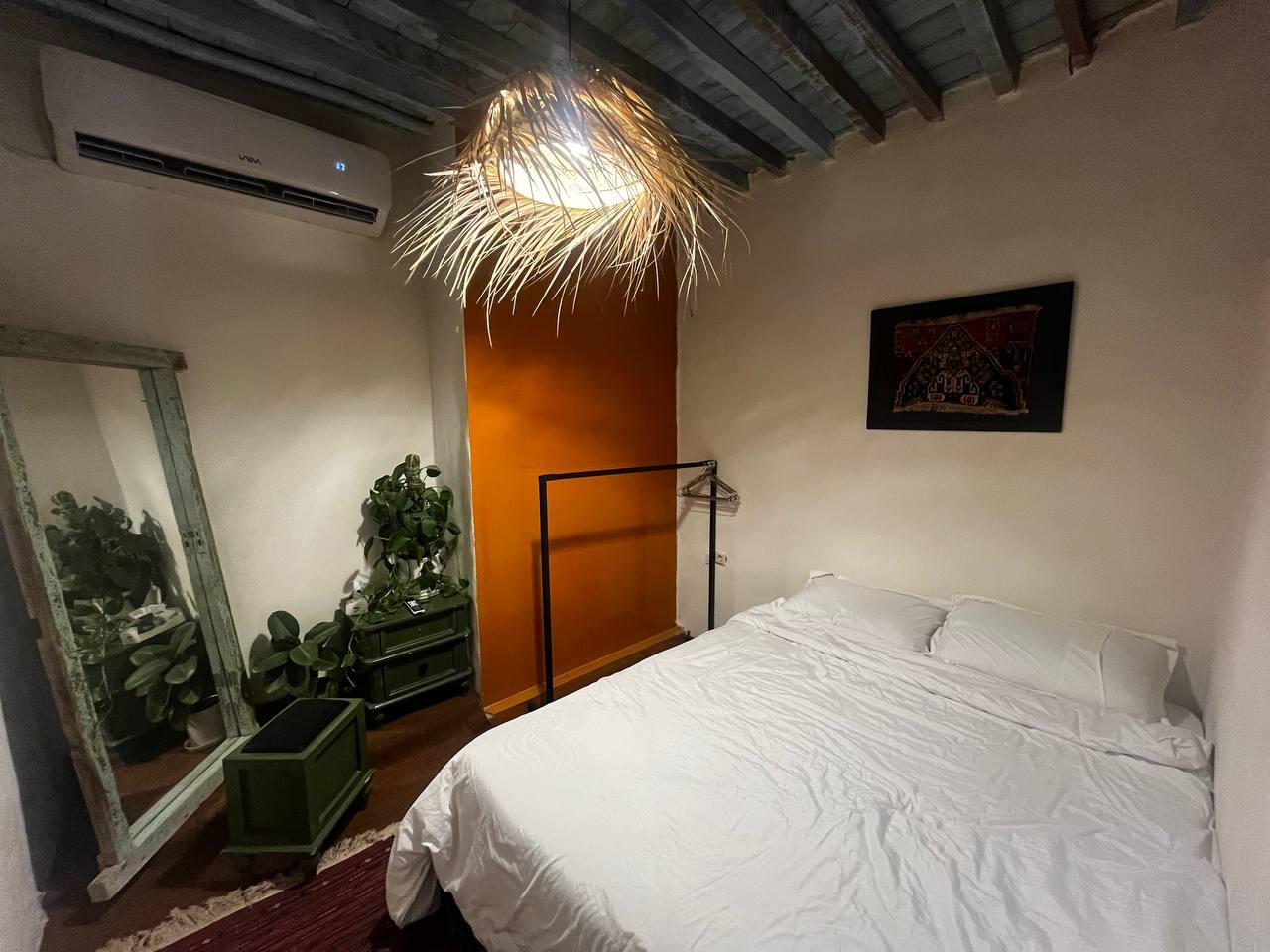 تختخواب در کنار اتاق پذیرایی تختخواب در کنار اتاق پذیرایی