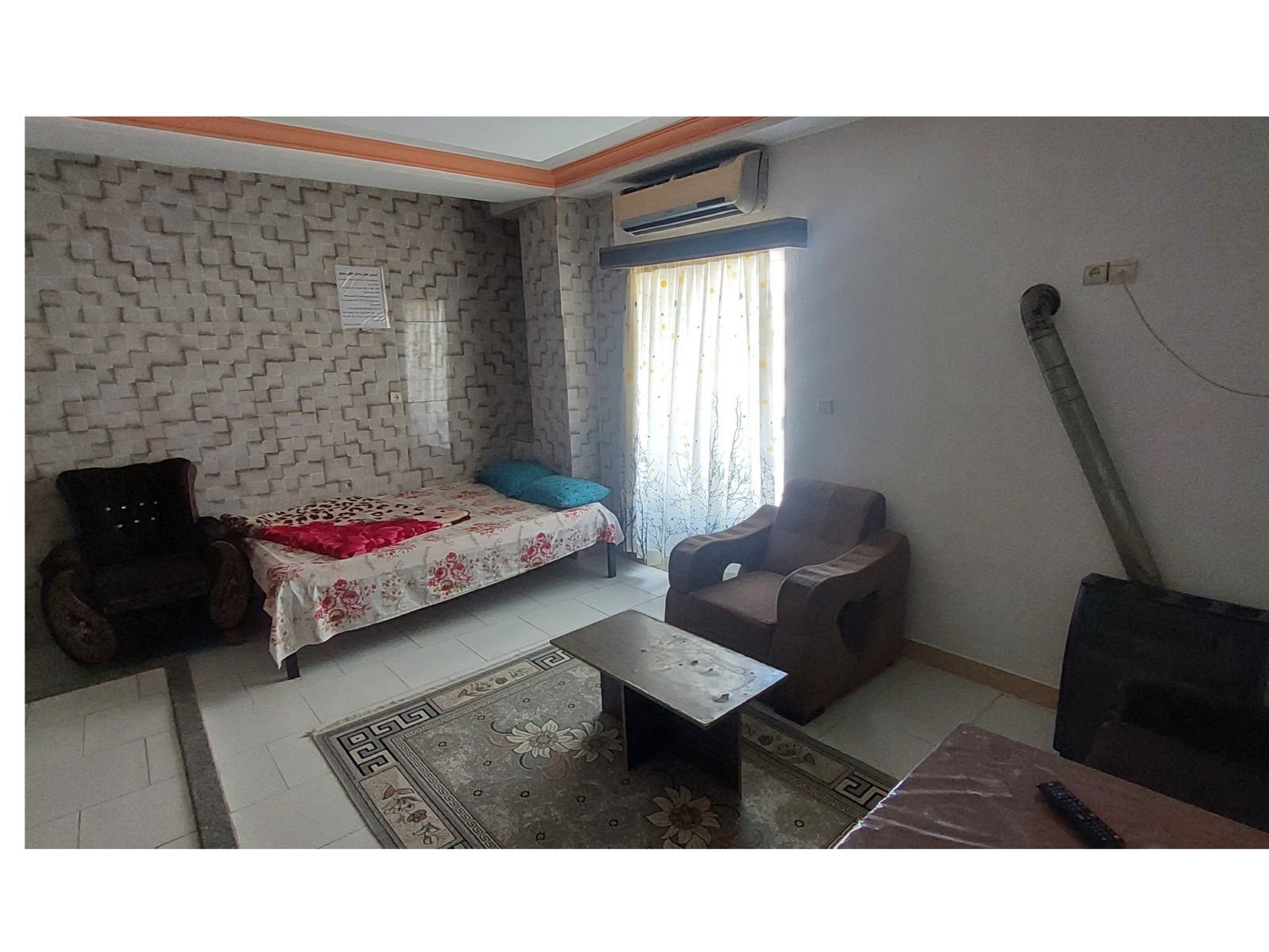 اتاق پذیرایی ویک تخت دونفره