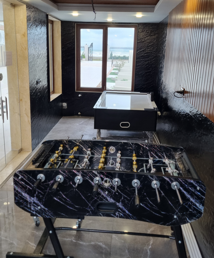 فوتبال دستی و ایرهاکی